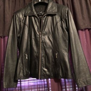 Ladies Wilsons black leather jacket.
